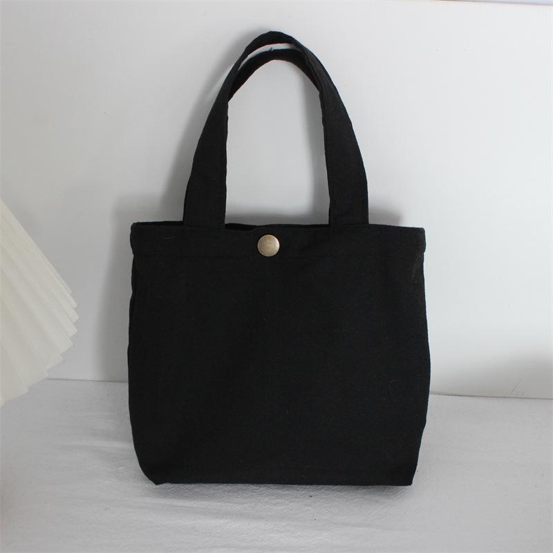 Effenkleurige eenvoudige lunchtas, draagbare canvas tas, kleine stoffen tas, draagbare canvas tas voor het opbergen van diverse spullen