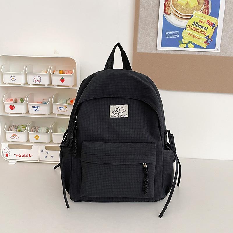 Schoolbag small fresh student schoolbag female Japanese cute solid color simple primary and secondary school student backpack leisure travel backpack