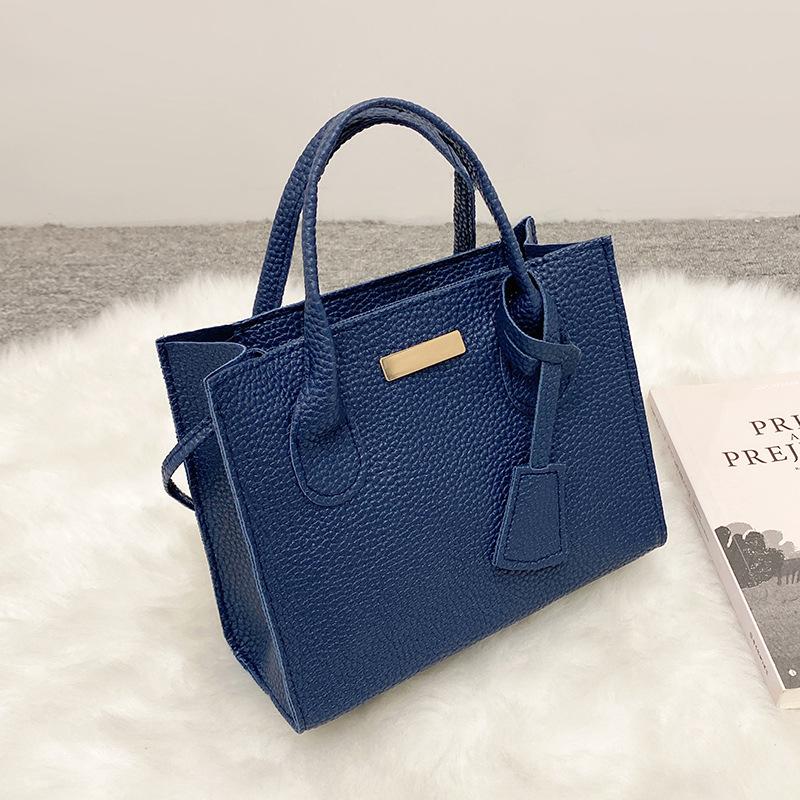 Damenhandtasche, Handytasche, Kosmetiktasche, kleine Einkaufstasche mit Litschi-Muster.