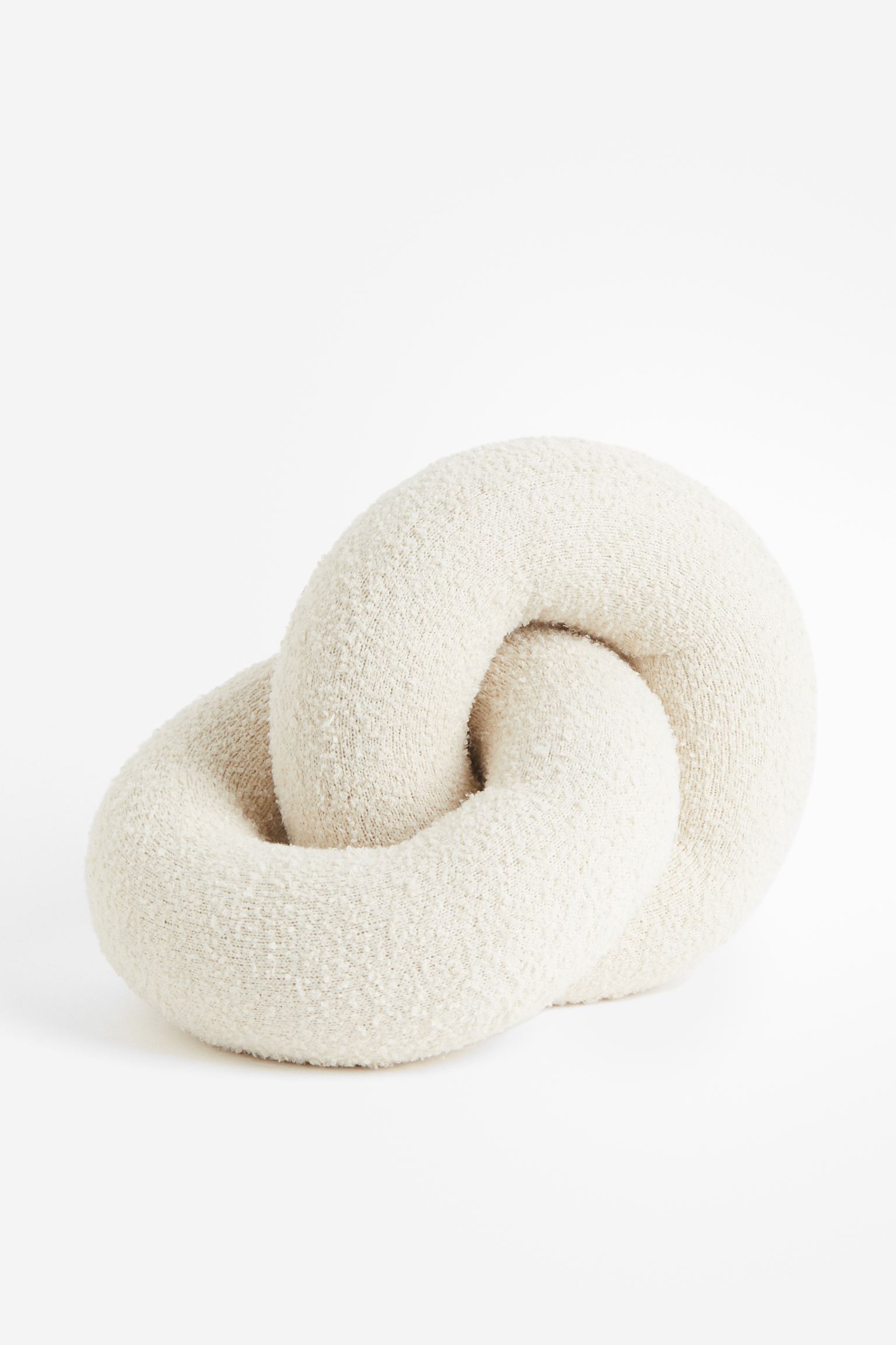 

Вязаная подушка-букле