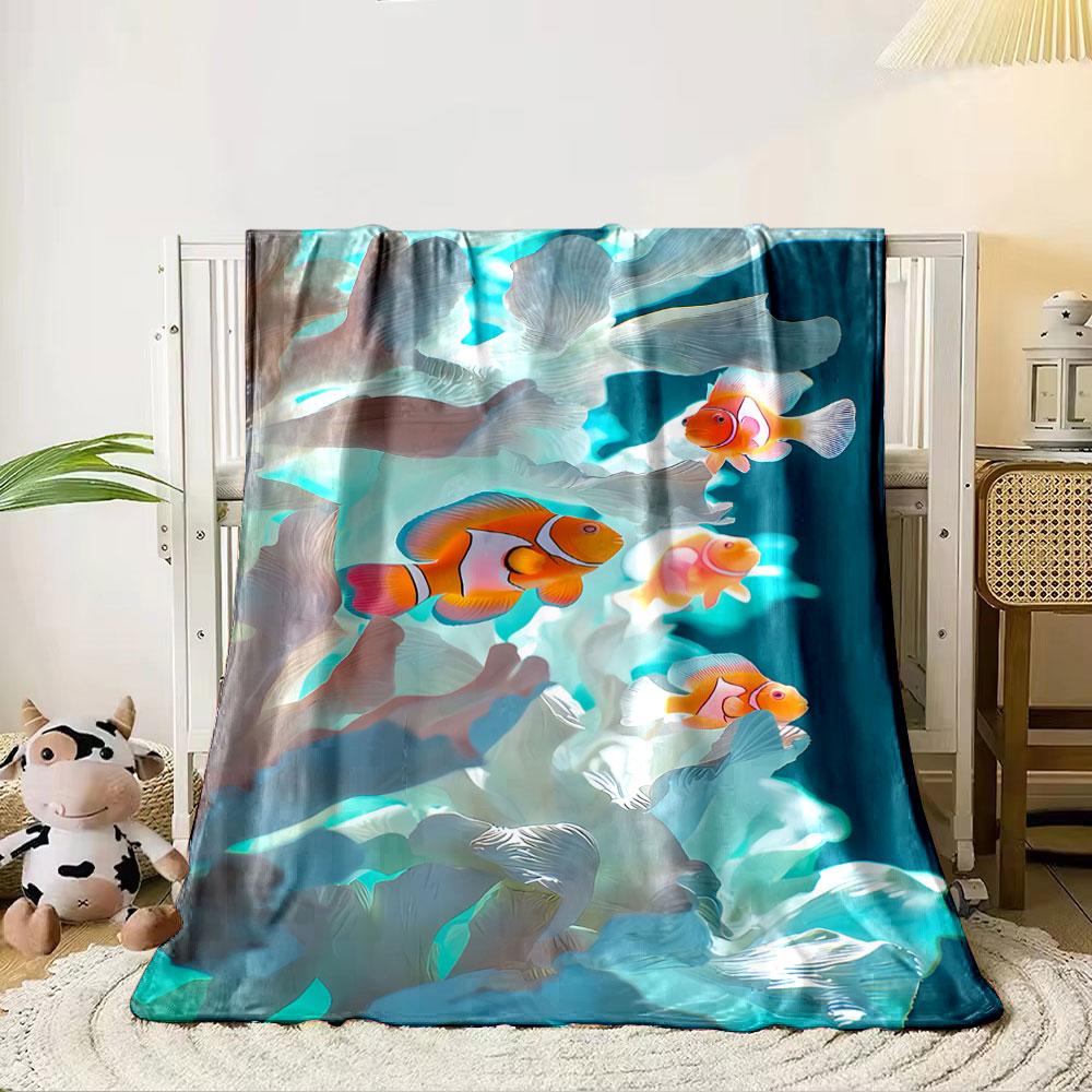 Bright orange clownfish swimming among flowing white coral shapes. for all seasons blanket lunch break throw gift 80cm x 120cm