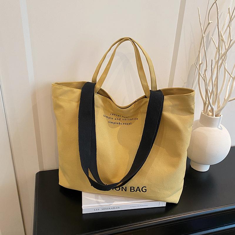 New Canvas Women's Bag Korean Street Trend Handbag Bag with Simple and Versatile Letters and Large Capacity Shoulder Oblique Span Bag