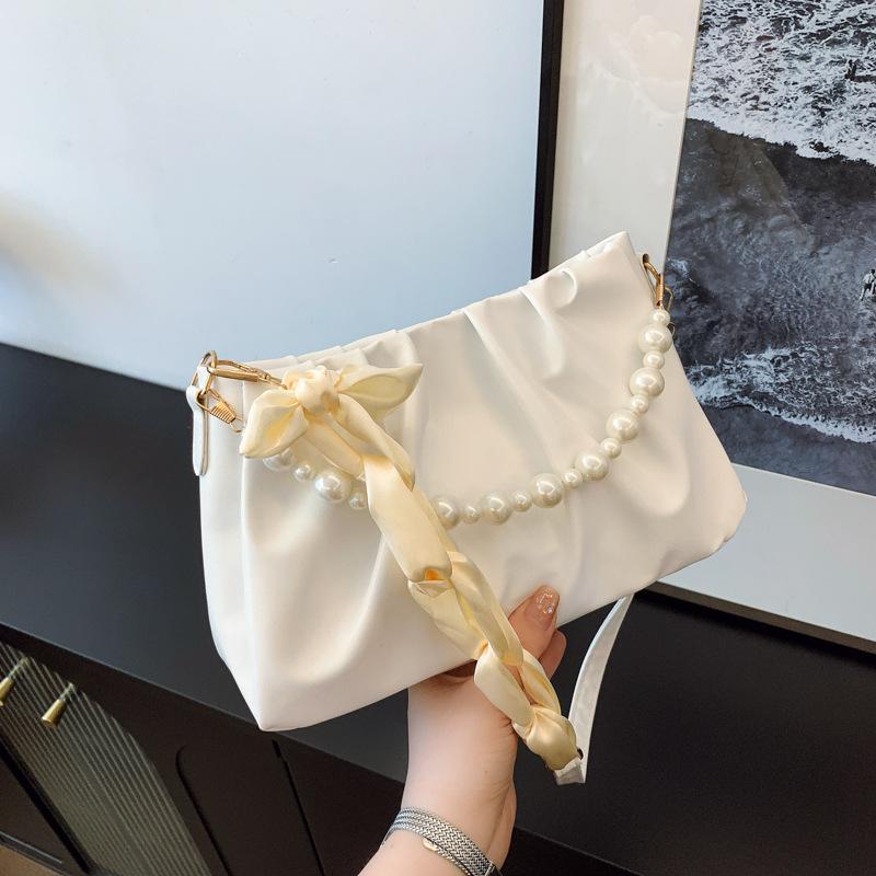 

High-value pearl pleated cloud underarm bag niche bag women s 2025 new summer versatile shoulder handbag бежевый