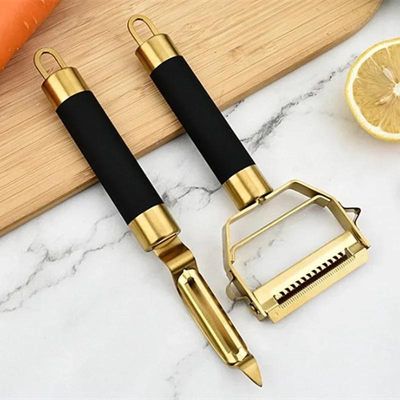 Äppelskalare i rostfritt stål Hushålls Guldpotatis Morot Rivjärn Manuell Melonhyvel med Hänghål Köksredskap för Grönsaker