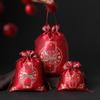 Elegant Wedding Celebration Candy Bags with Sunflower Seeds & Peanuts, No Folding Needed, High-End Drawstring Design, Handheld Cloth Bags.