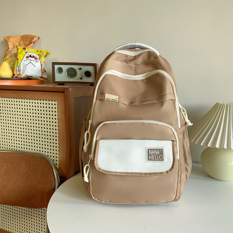 

2025 spring new fashionable large-capacity student schoolbag casual backpack light spine protection outdoor travel backpack order number хаки