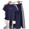 A Large-sized Casual Summer Women's New Slimming T-shirt Top and Elegant Half Skirt Two-piece Set
