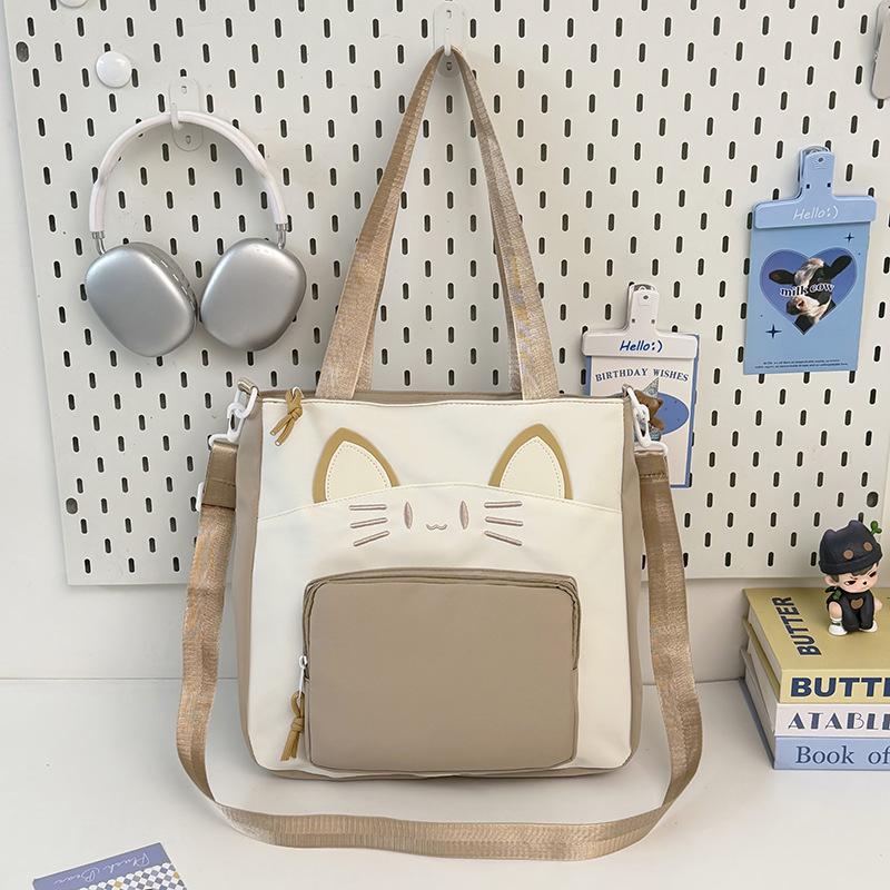 College style, large-capacity cat contrasting color, portable tote bag, girl commuter make-up bag, messenger bag, shoulder bag, school bag.