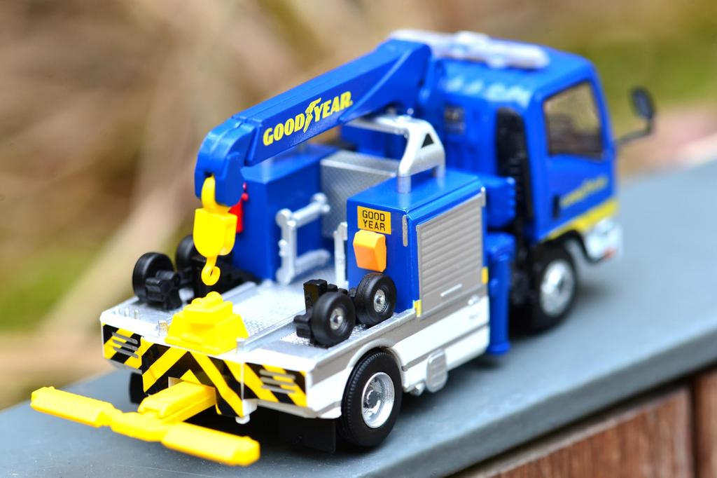 Tiny City 1/76 scale diecast model car of the Isuzu N-Series Tow Truck by Goodyear