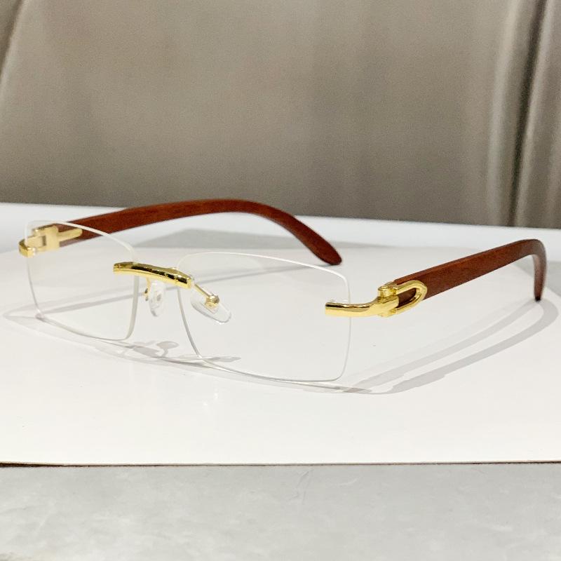 

Модные солнцезащитные очки без оправы с обрезанными краями и дужками под дерево для женщин