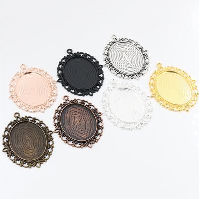Nouvelle Mode 5pcs 30x40mm Taille Intérieure 7 Couleurs Dentelle Perforée Style Fleur Cabochon Plateau Base Support Charms Pendentif