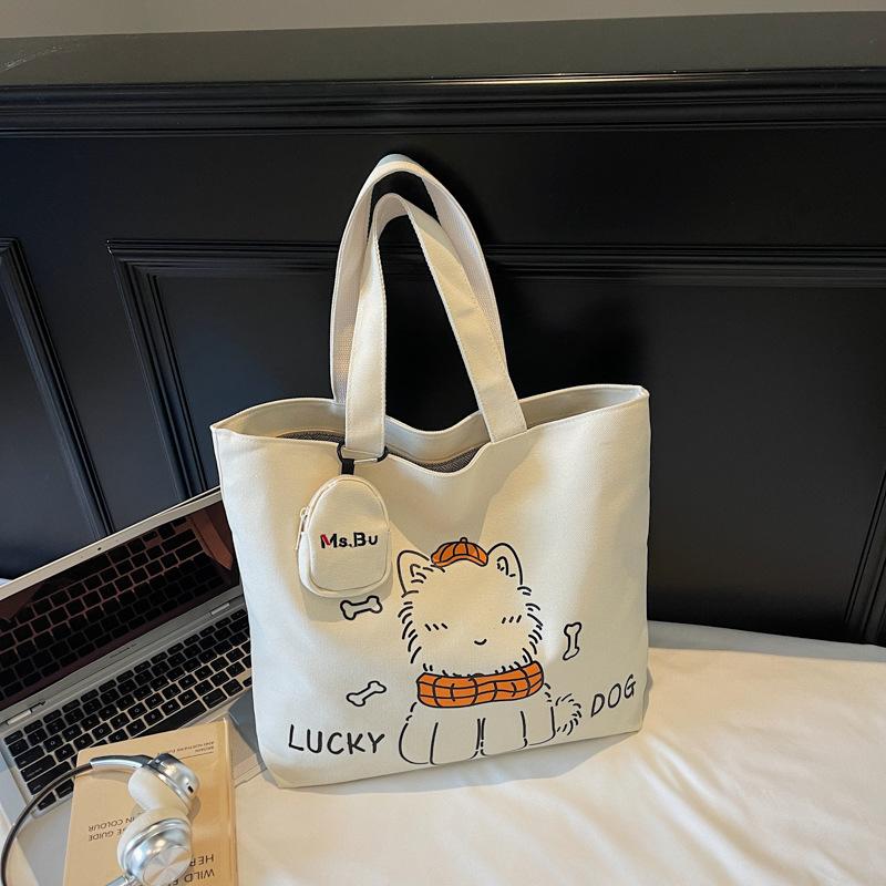 Casual large-capacity canvas bag women's 2025 new lightweight niche commuter shoulder bag graffiti portable tote bag