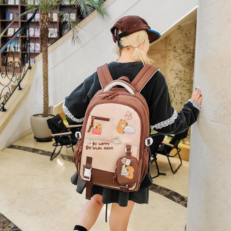 School bag 2025 new casual versatile college style large capacity junior high school student school bag waterproof printing high value backpack