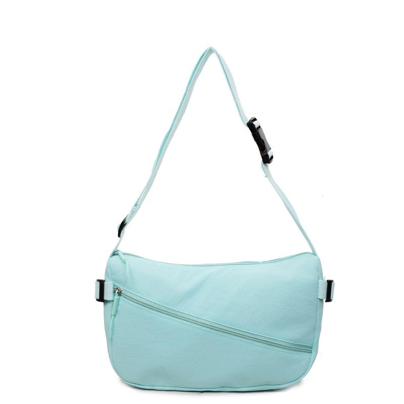 

Женская сумка-мессенджер подмышку для поездок на работу светло-синий