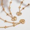 Qiong Yao 5A Zircon Heart Pendant Necklace with Diamond Accents, 18K Gold-Plated Stainless Steel.