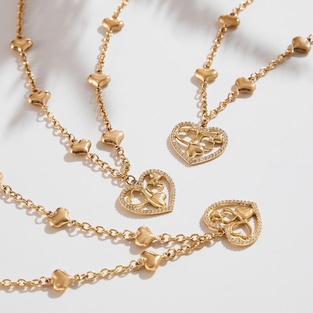 Qiong Yao 5A Zircon Heart Pendant Necklace with Diamond Accents, 18K Gold-Plated Stainless Steel.