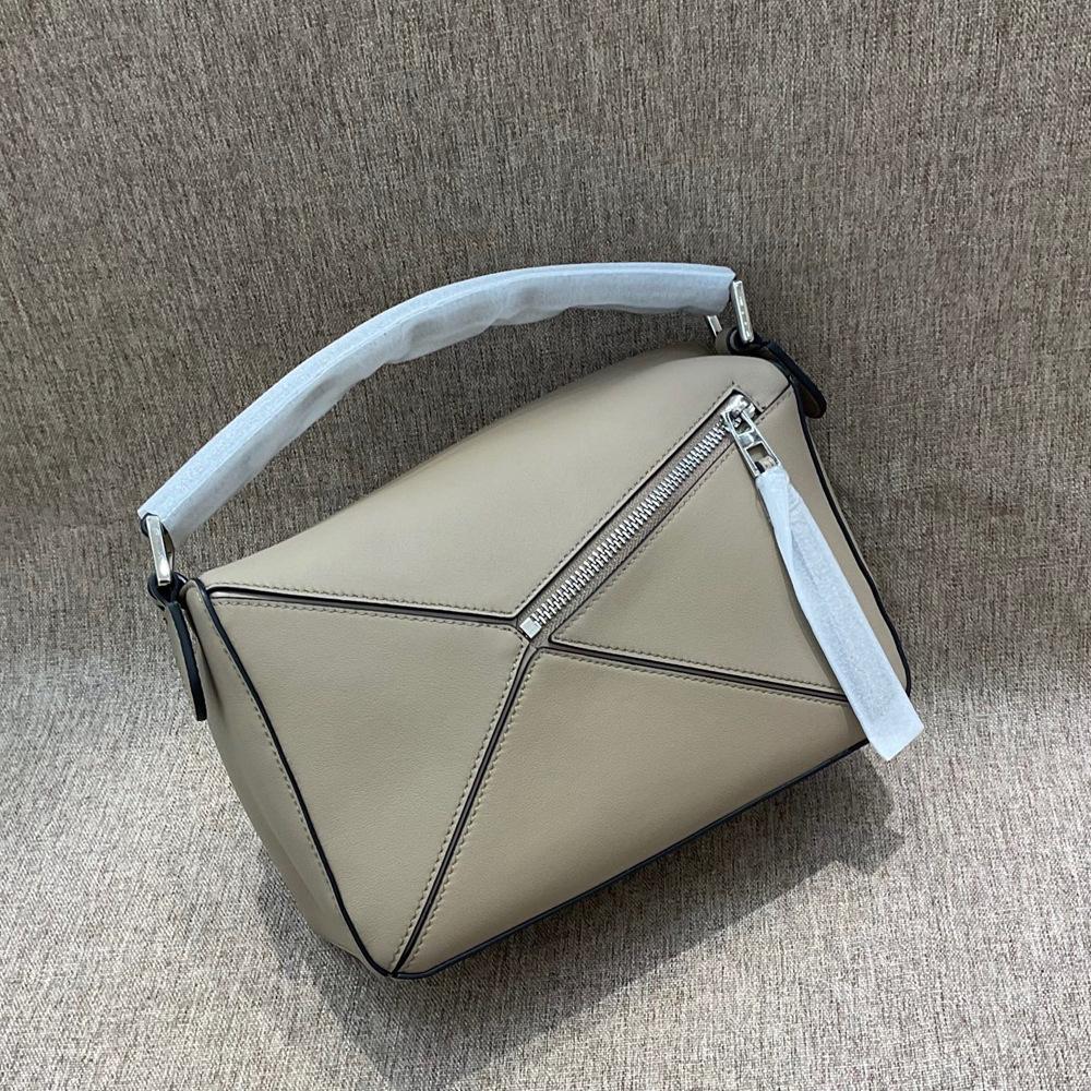 New Crossbody Bag Women s Genuine Leather Geometric Bag Fashion Splicing Handheld Shoulder Bag Trendy Personalized Pillow Bag 17x7.5x12cm
