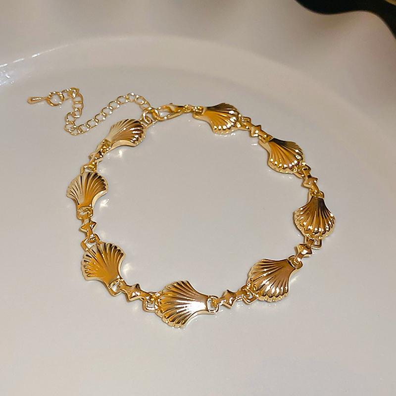 

Золотая ракушка Ретро цветок Женский браслет Легкая роскошь Универсальный Уникальный дизайн Банкетные украшения Аксессуары для девушки