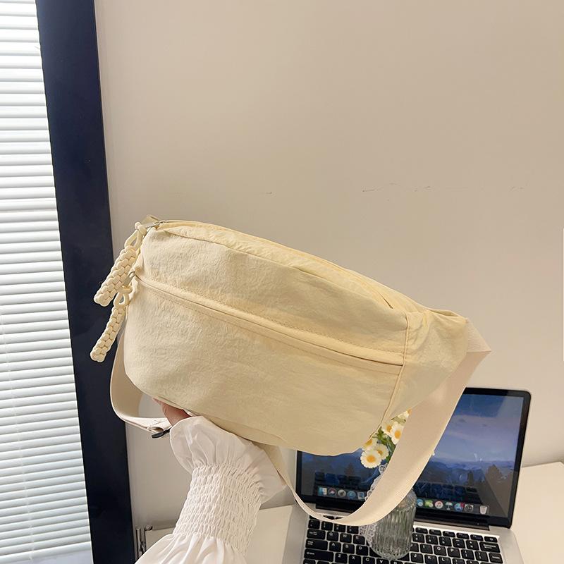 

Summer new simple and lightweight men s and women s shoulder messenger bag solid color portable breast bag versatile bag