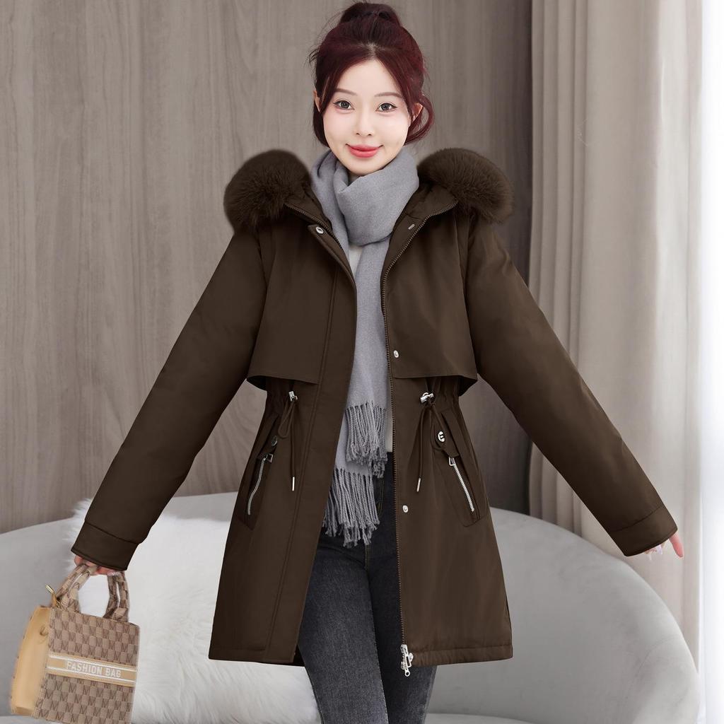 Überwindet die lange koreanische Version von lockerer Baumwollwattierter Kleidung für Damen, fügt Samt hinzu und verdickt die Taille, wattierte Jacke Mantel im Winter.