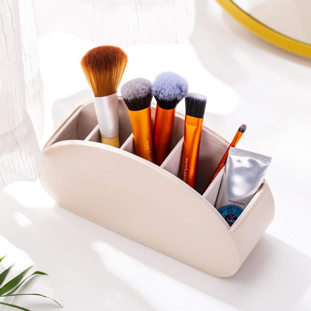 Stylish, Waterproof, Multi-functional Remote Control Rack with PU Leather, 5 Compartments, and a Multi-functional Remote Control Stand. Ideal for