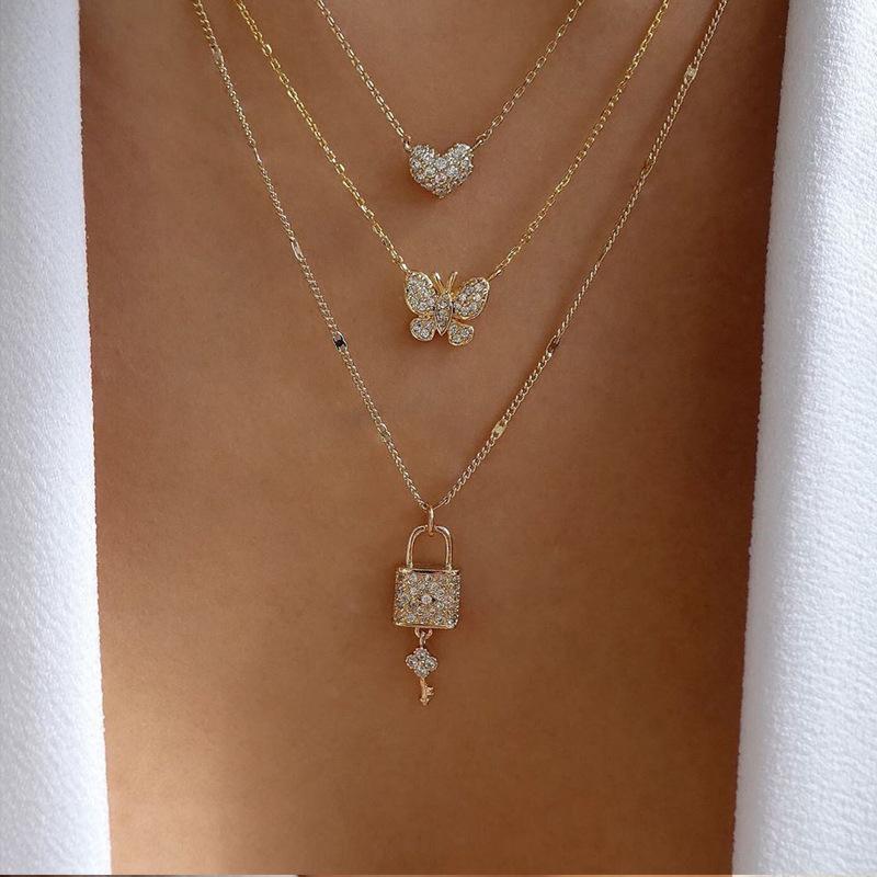 

Butterfly love necklace wholesale European and American new personalized jewelry key pendant multi-layer women s street shot crystal sweater chain