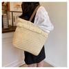 New straw bag hand-woven tassel fashionable and simple portable women's bag large capacity shoulder bag women