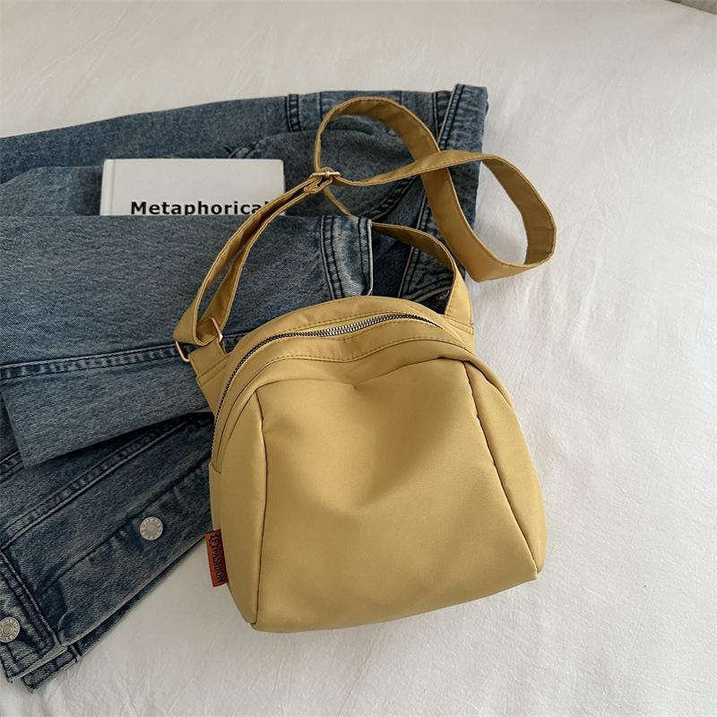 

Модна повсякденна маленька кругла сумка Сумка через плече Тенденційна проста нова чоловіча сумка на плече 2024 р. Повсякденна жіноча сумка жовтий