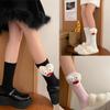 Trendige mittellange Socken mit lustigem Augenmuster Stilvolle Wahl für modebewusste Personen