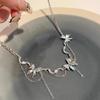 Lake blue liquid butterfly necklace, light luxury, niche design, high-end design, sweater chain, new women's collarbone chain