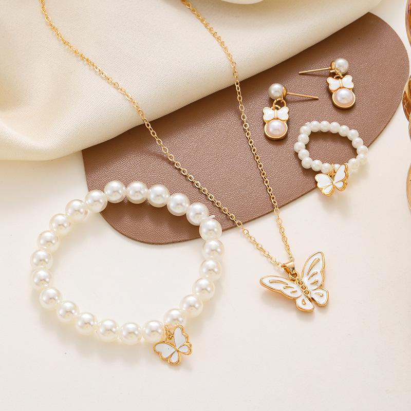 Charming Pearl Butterfly Jewelry Set: Necklace, Earrings, Ring & Bracelet