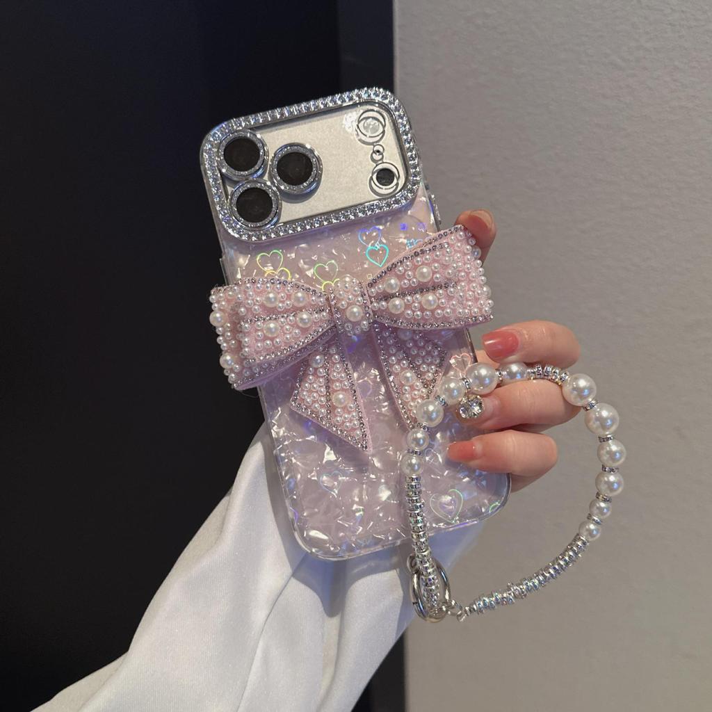 Porous Love Shell Pattern Phone Case for Apple 17PROMAX/15, Material 11/14, with Bow Accessory.