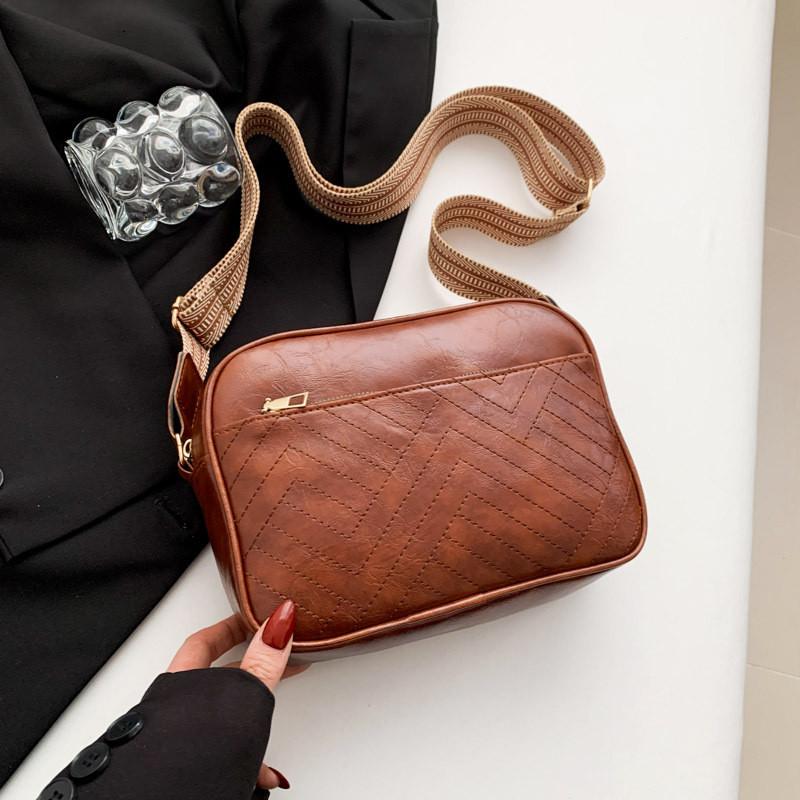 

Elegant Spring Fashion Small Crossbody Bag For Women Featuring Trendy Colors And Unique Style RedBrown