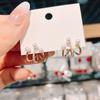 Light Luxury Niche Design Curved Hook Pearl Earrings 2023 French Temperament Stud Earrings Xiaohongshu Same Style