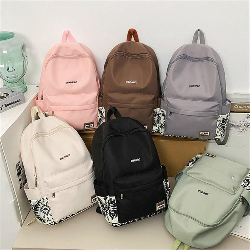 Schultasche Freizeitrucksack Damen Nylon bedruckt Studenten Schultasche Einfacher Rucksack Großhandel Mittelschüler Schultasche Rucksack Herren