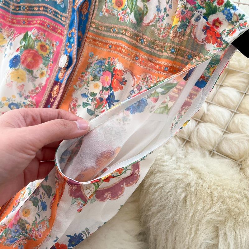 This Women's Vacation Style Elegant Sleeveless Waist-cinching Printed Pleated Dress Is A Fashionable and Slimming Dress