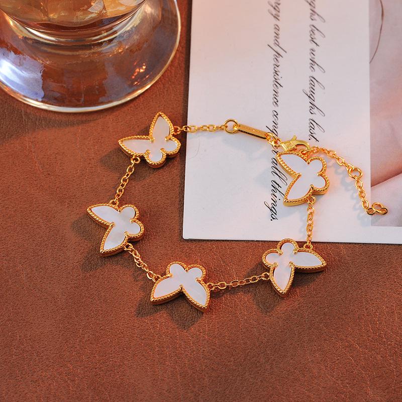 

Elegant Copper Gold Double-Sided Butterfly Bracelet with a Versatile Design