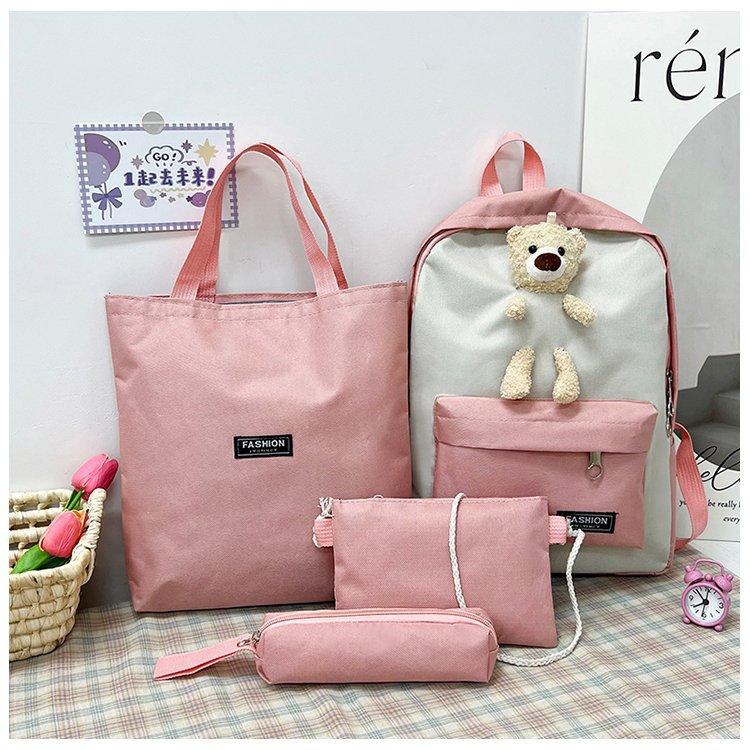 

School bag female original middle and high school students shoulder back cute bear nylon large capacity four-piece set