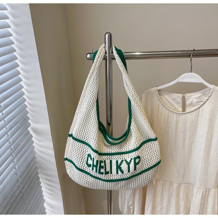 

Large capacity knitted woven bag women s summer new casual shoulder bag high-end commuter tote bag