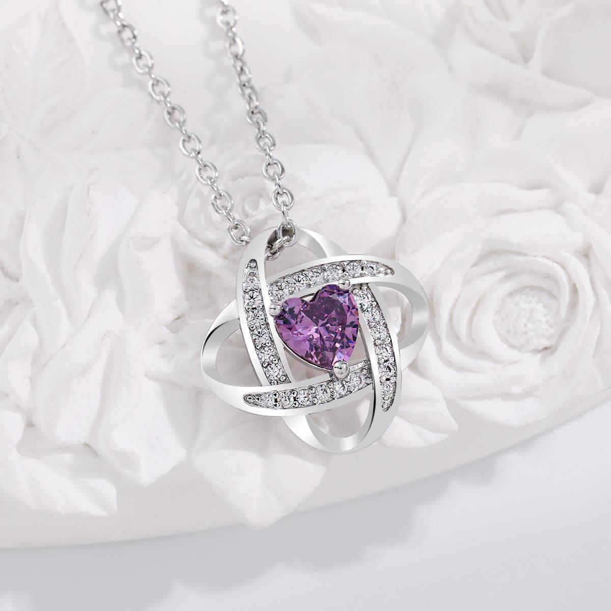 

Lucky Clover Birthstone Rotating Heart Necklace