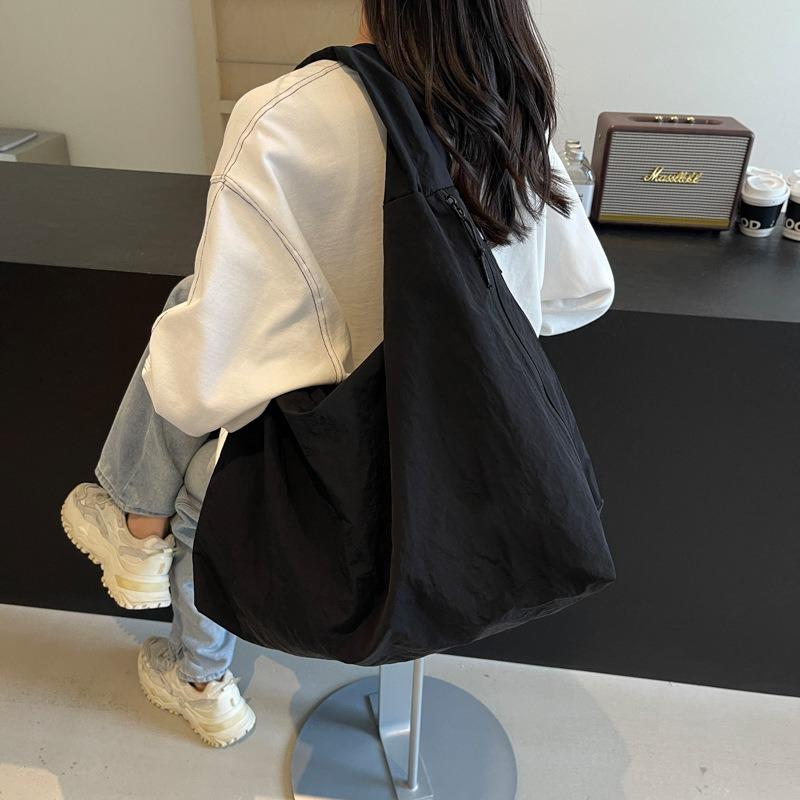 Slack fashion casual canvas tote bag women's new versatile large capacity armpit bag commuter shoulder bag