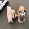 Cartoon doll thick-soled one-word slippers female summer design sense cute fringed beach shoes flat-soled semi-drag cool slippers