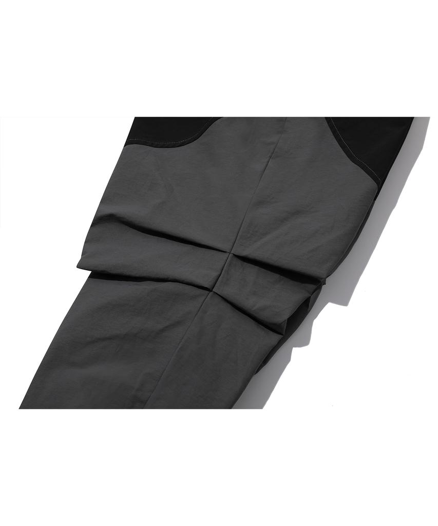 CPGN STUDIO Round Cut Dart Nylon Pants Black