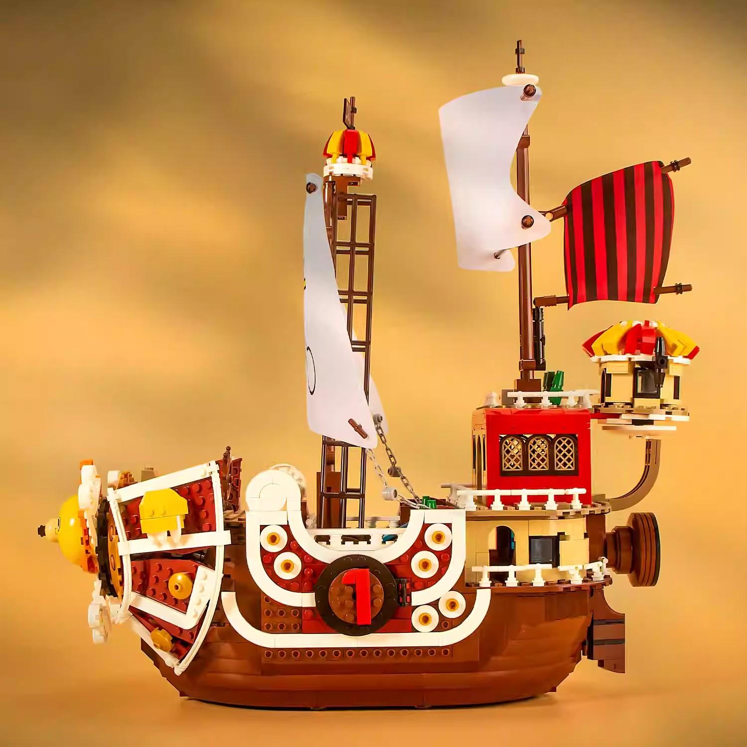 

2000 шт. креативная модель корабля Thousand Sunny, строительные блоки, мультяшное аниме, 9 фигурок, пиратская лодка, кирпичные игрушки, рождественские подарки для детей