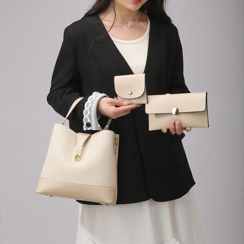 Large-capacity versatile bucket bag, commuter bag, simple and high-end women's bag, new shoulder portable messenger women's bag.
