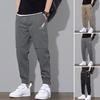 Pantalones de hombre con bolsillos con estampado de logotipo y cintura elástica de talle medio, pantalones de chándal informales de Color sólido, ropa de calle