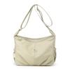 Elegant Slouch Shoulder Bag with Top Zip Closure Adjustable Strap Geometric Stitching and Smooth Nylon Fabric for Modern Daily Wear and Commuting
