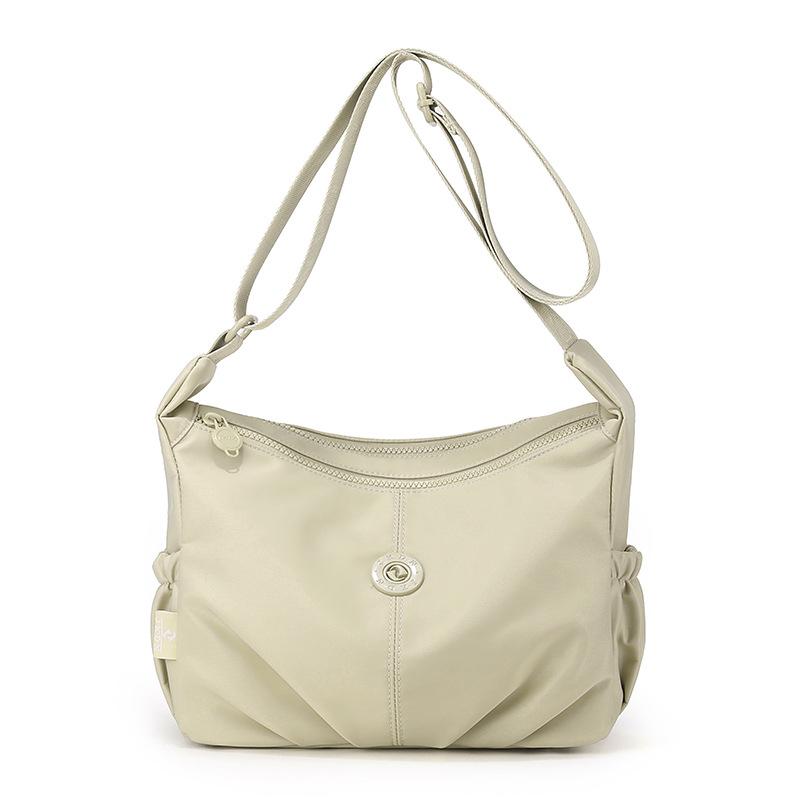 Elegant Slouch Shoulder Bag with Top Zip Closure Adjustable Strap Geometric Stitching and Smooth Nylon Fabric for Modern Daily Wear and Commuting