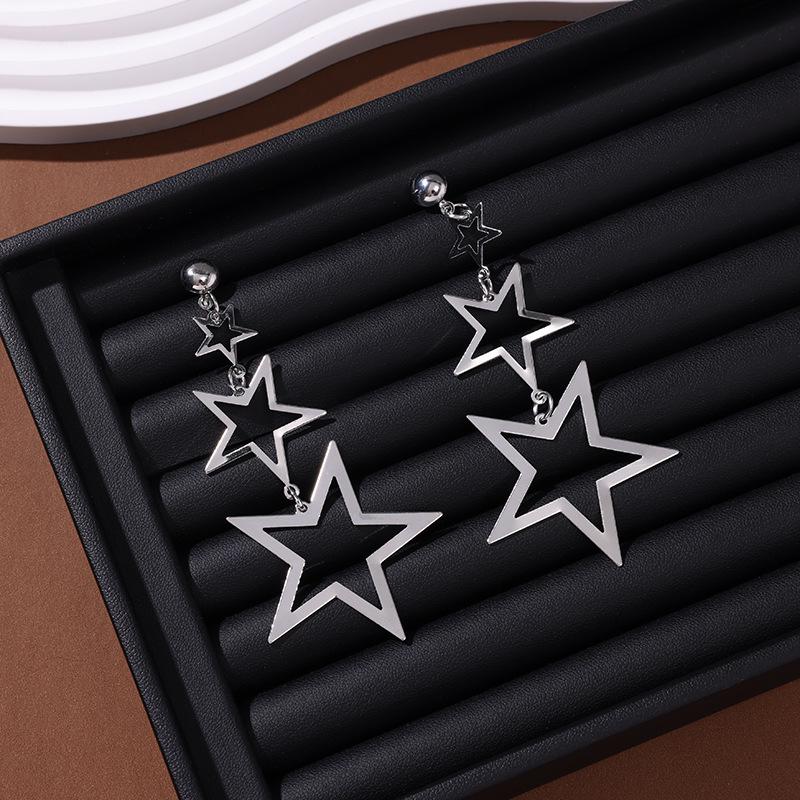 

High-End Cross-Border Earrings: Floral Heart, Star Tassel, and Bold Stud Designs