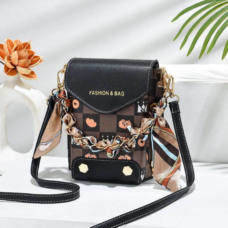 

Женская сумка для мобильного телефона CrossBorder большой вместимости 2024 года: Высококачественная вертикальная сумка-мессенджер с двумя отделениями.